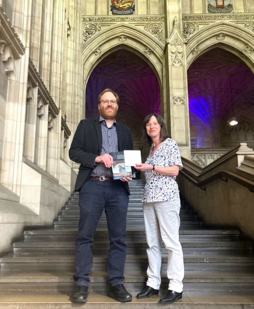 Professor Paula Giliker with second prize winner of the Margaret Brazier Prize for Outstanding Mid-Career Legal Scholarship Dr Joshua Paine for his book The Functions of International Adjudication and International Environmental Litigation, at the 2024 SLS Conference at the University of Bristol Law School.